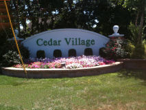 Cedar Village Sign